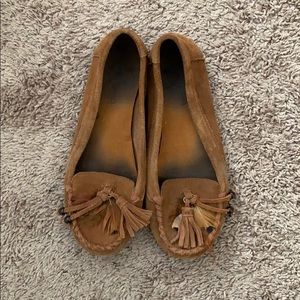 Minnetonka moccasins with feathers and tassels